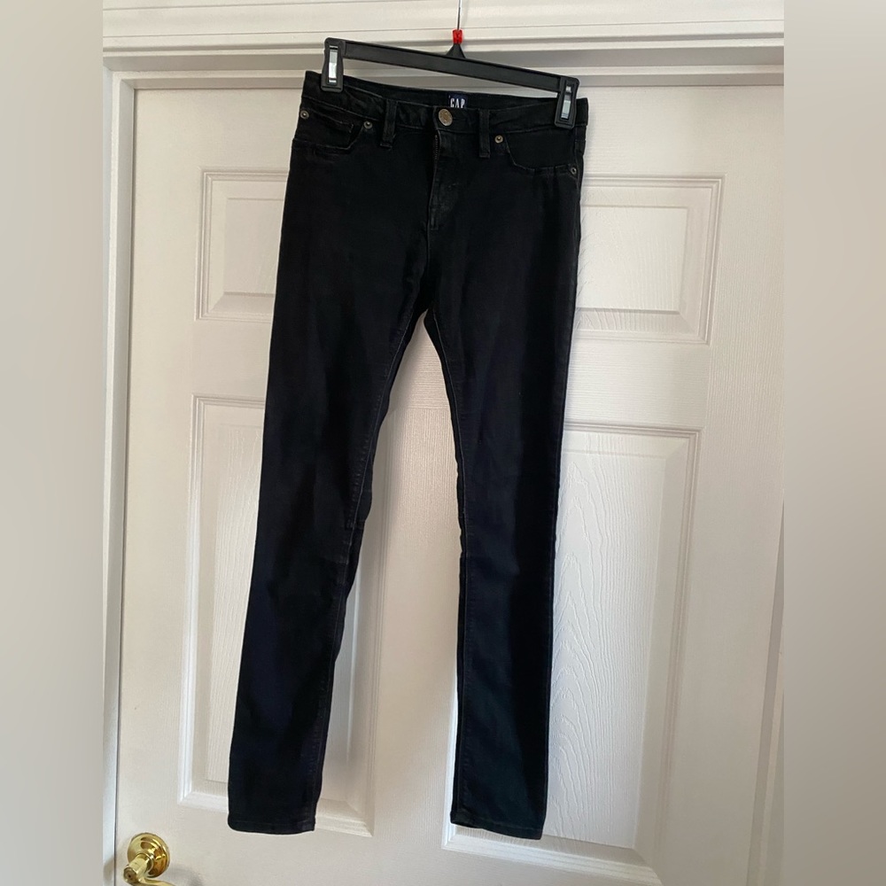 Girls stretch super skinny black jeans by GAP